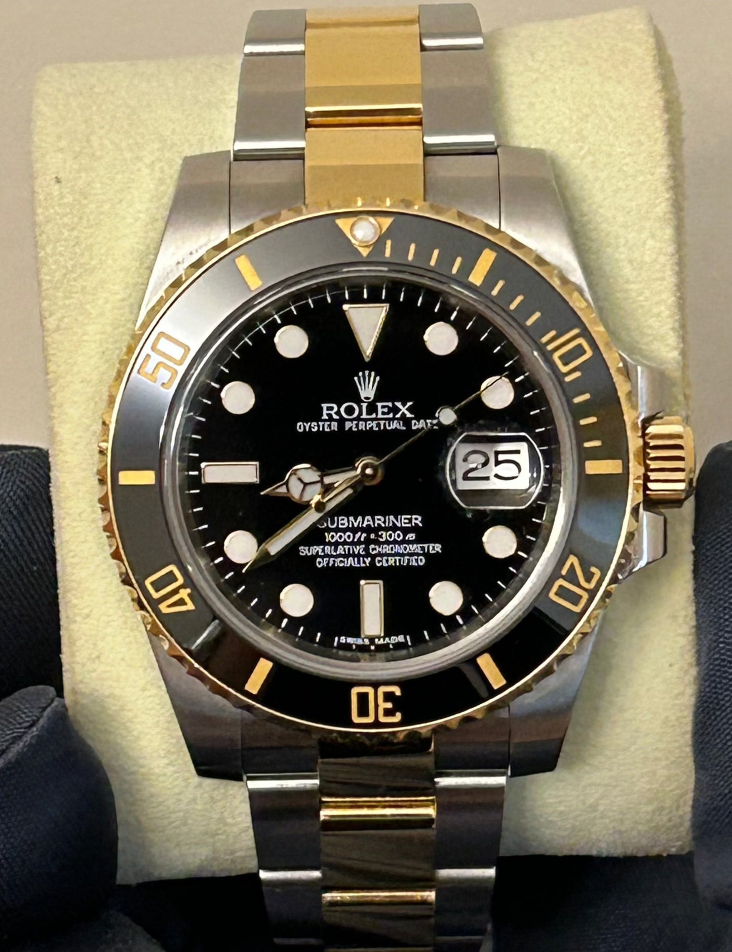 2010 Rolex Submariner Date Two-Tone stainless steel and yellow gold Black Dial in hand